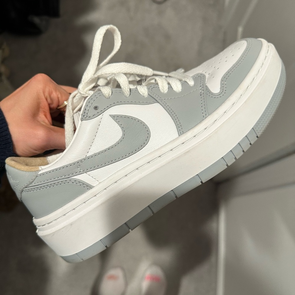 Grey and white Nike Air Jordan 1